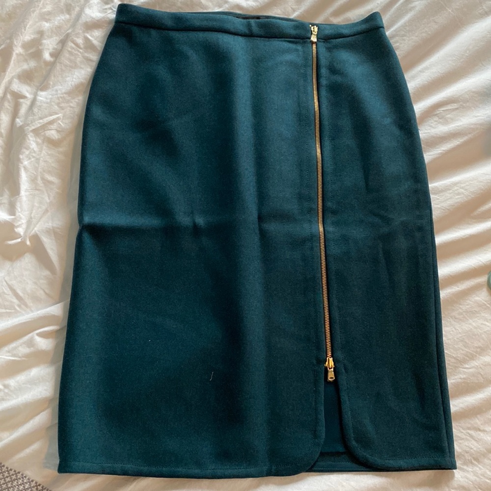 J Crew zippered wool skirt in dark green. Fully lined.